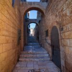 An,Old,And,Ancient,Alley,Paved,With,Stone,Tiles,,In